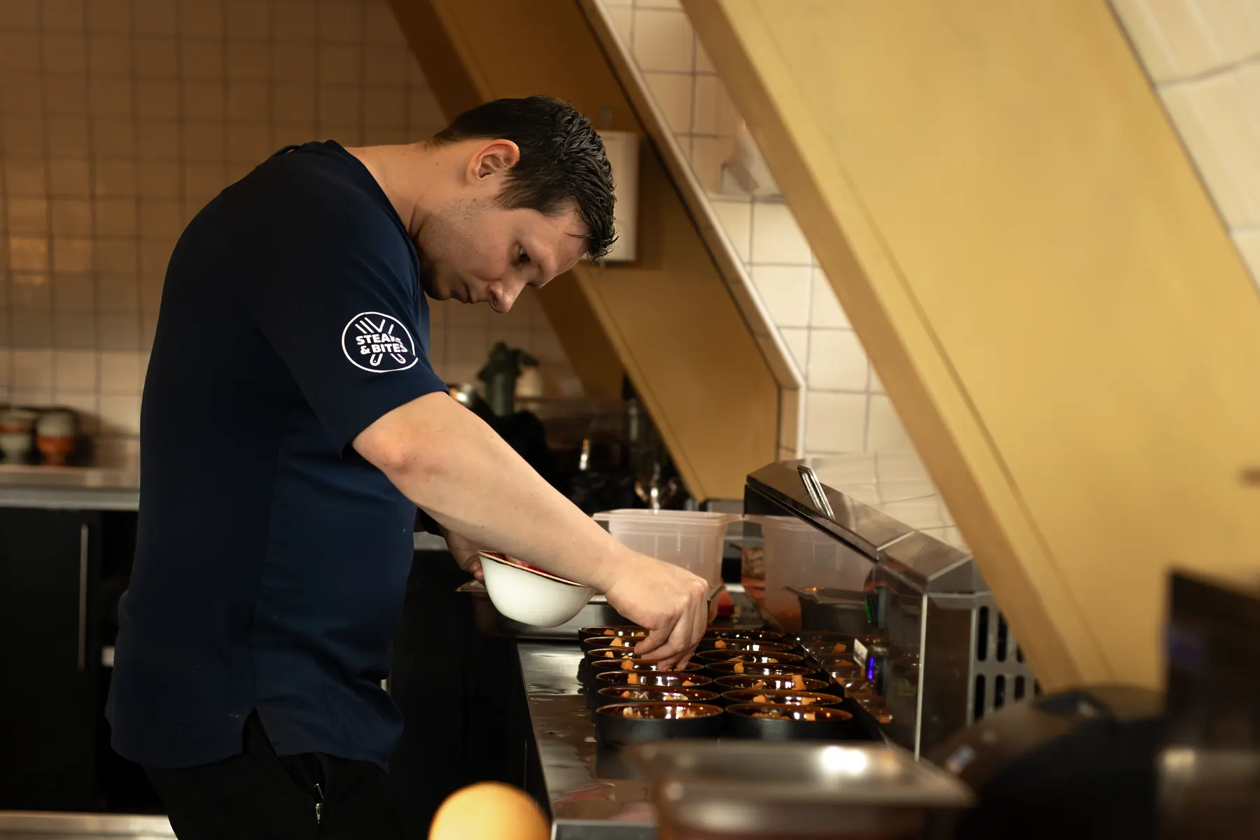 Chef aan het werk bij Plexat